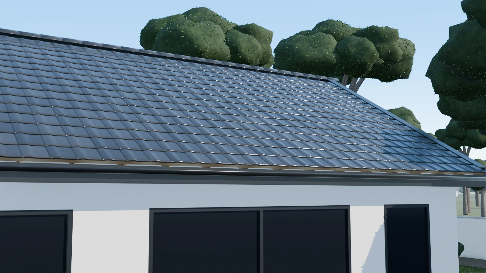 A charcoal gutter and fascia running along a white wall
